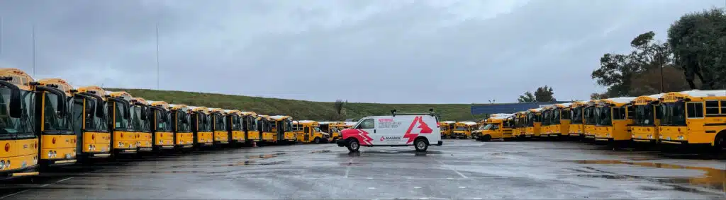 AMAROK-van-in-school-bus-lot