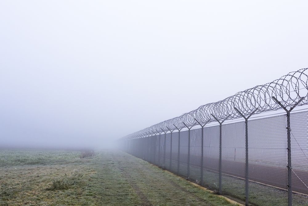 Perimeter Fence on a Foggy Day
